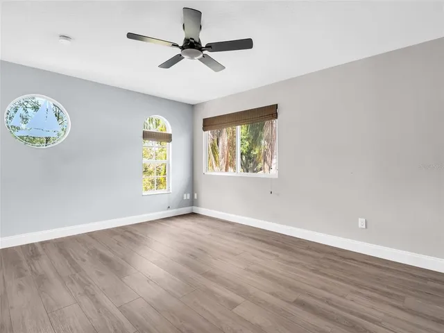 an aerial view of a house with a garden