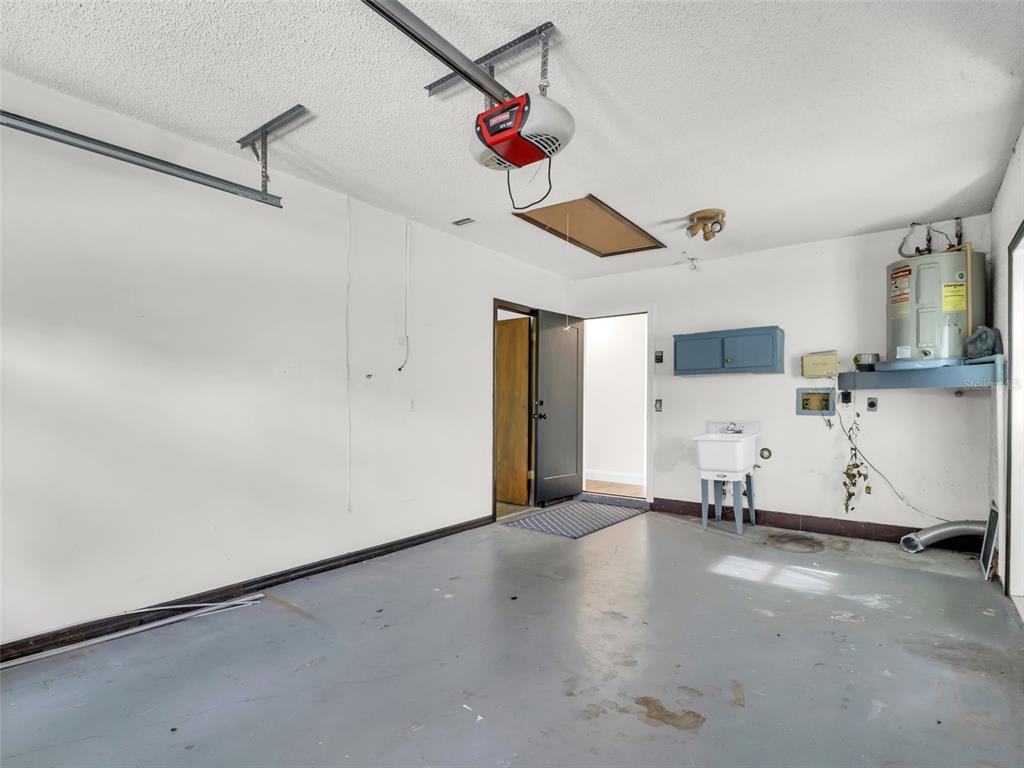 640 Kenneth Way Tarpon Springs, FL 34689 - Photo 61 of 84 a view of a storage & utility room