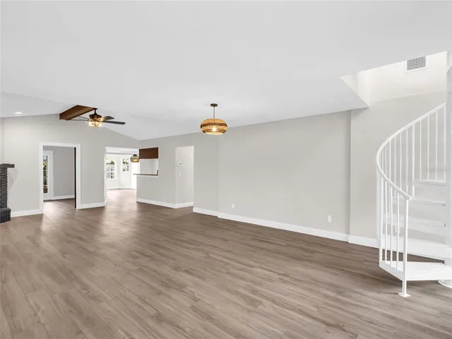 a kitchen with a sink and a stove