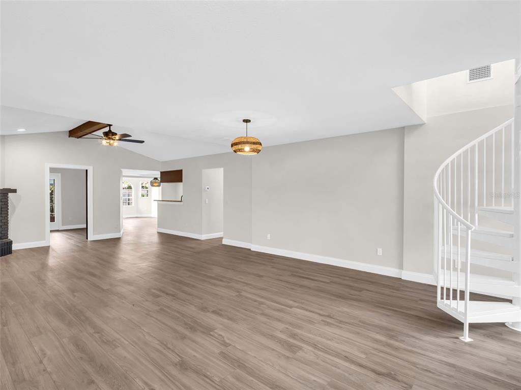 640 Kenneth Way Tarpon Springs, FL 34689 - Photo 8 of 84 a view of a livingroom with wooden floor