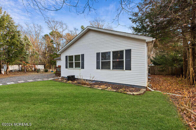 41 Hilltop Road Howell, NJ 07731 - Photo 2 of 24 a view of a house with a yard