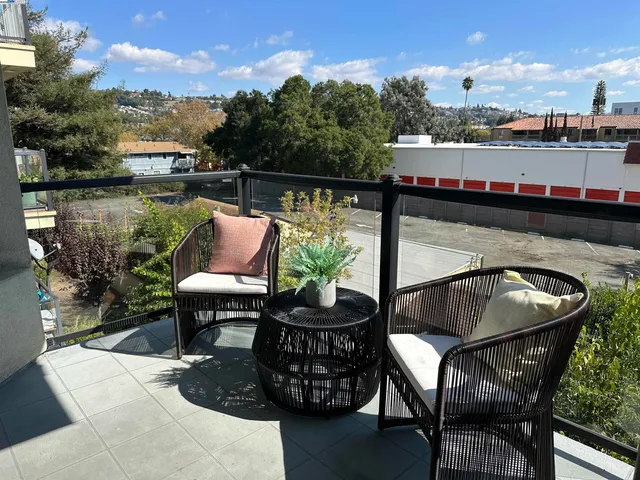 a front view of a building with street view