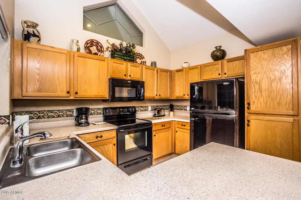 2801 North Litchfield Road, Unit 50 Goodyear, AZ 85395 - Photo 7 of 24 Kitchen view from living room