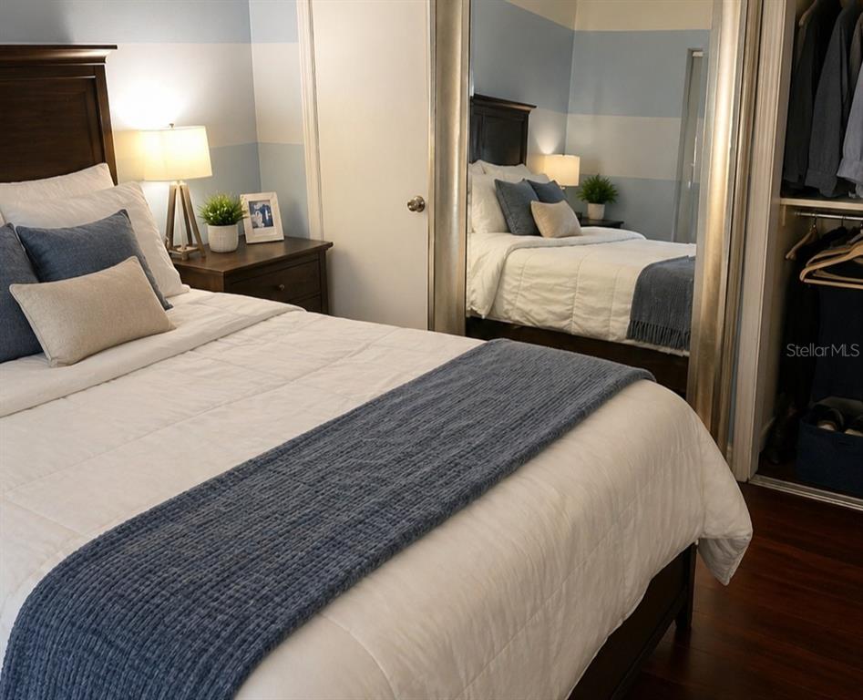 1900 Winter Park Road Winter Park, FL 32789 - Photo 12 of 22 a bedroom with a bed and a tv