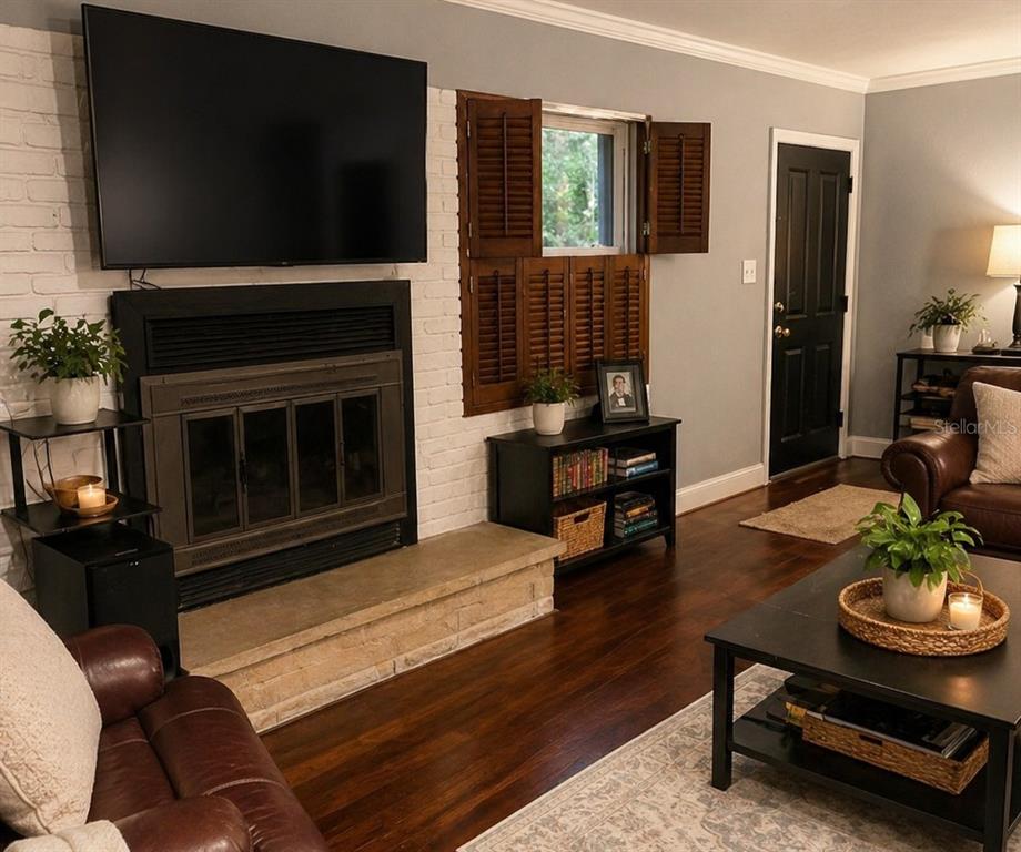 1900 Winter Park Road Winter Park, FL 32789 - Photo 6 of 22 a living room with furniture and a flat screen tv