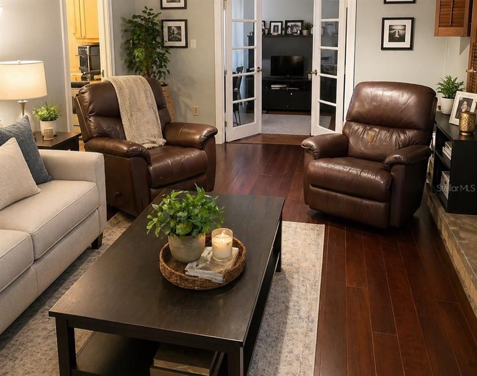1900 Winter Park Road Winter Park, FL 32789 - Photo 8 of 22 a living room with furniture and wooden floor