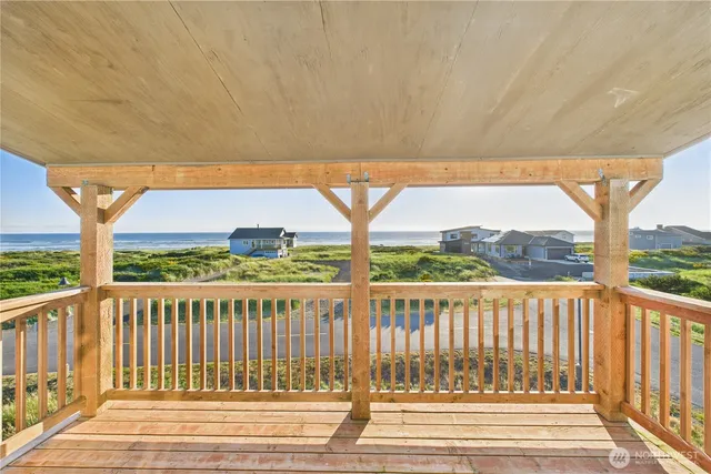 a view of a two chairs in the deck