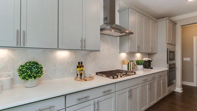 a kitchen with appliances and cabinets