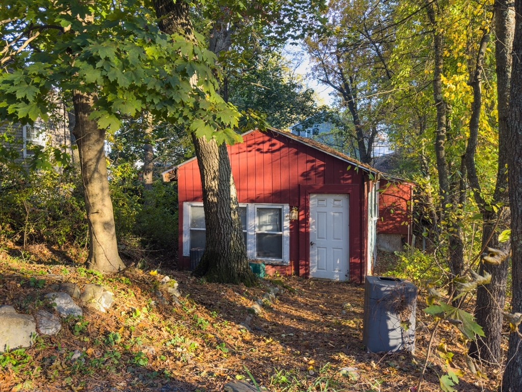 12 Parkview Terrace North Reading, MA 01864 - Photo 1 of 9 a backyard of a house with lots of green space
