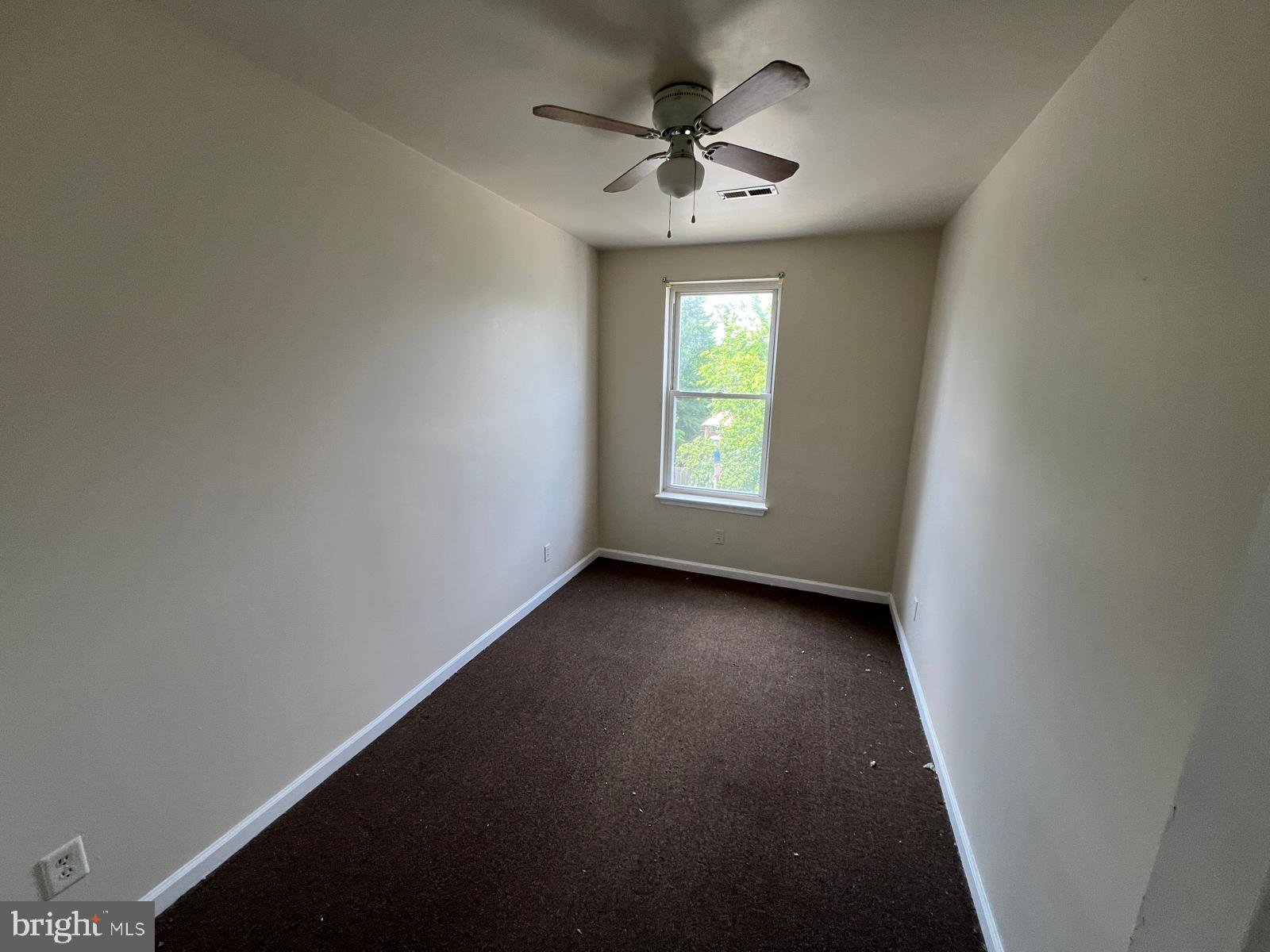 3907 Fairview Avenue Baltimore, MD 21216 - Photo 16 of 25 an empty room with a window