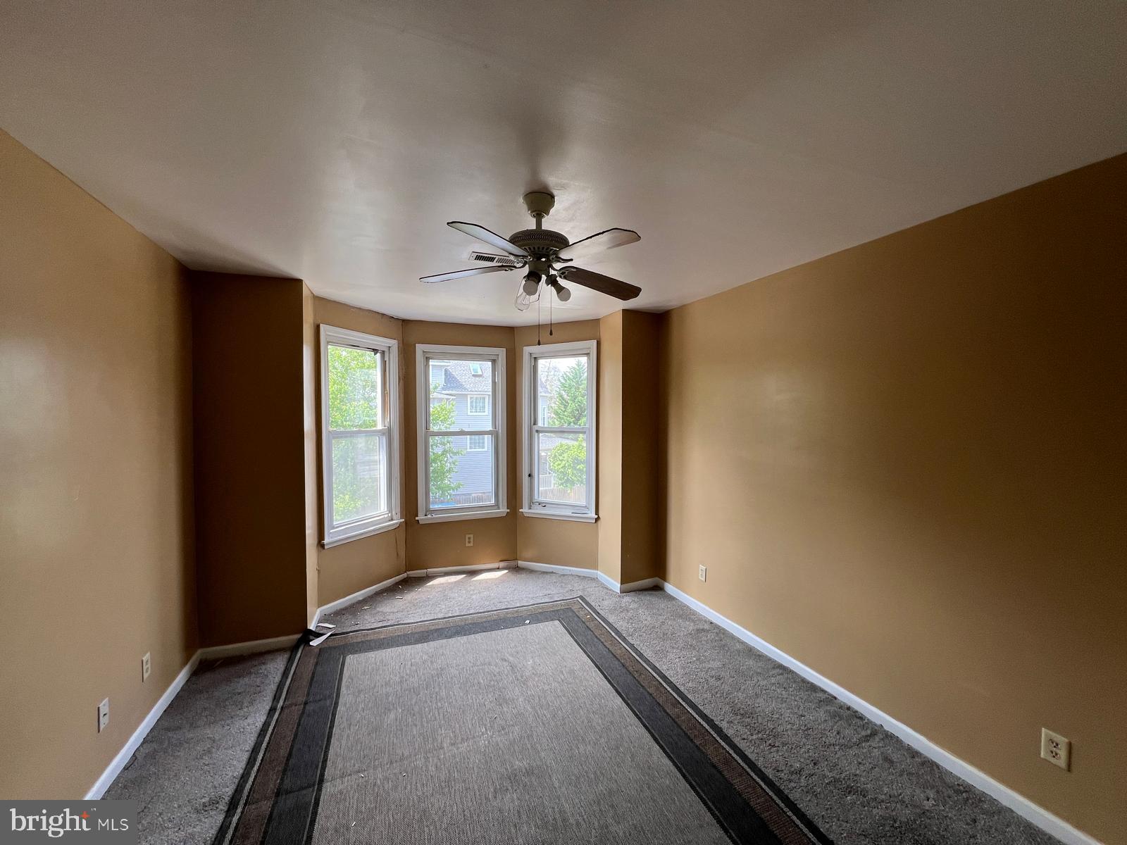3907 Fairview Avenue Baltimore, MD 21216 - Photo 17 of 25 a view of an empty room with a window