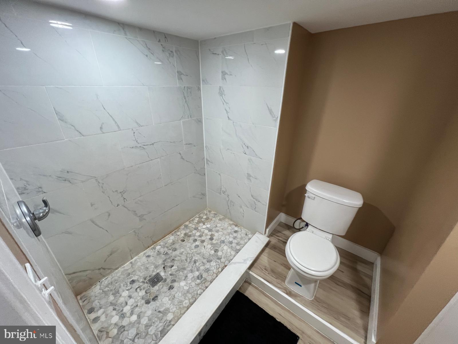 3907 Fairview Avenue Baltimore, MD 21216 - Photo 24 of 25 a bathroom with a sink and a toilet