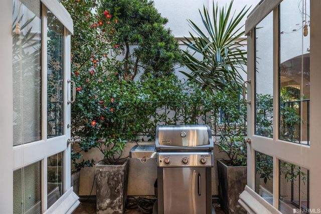 a bedroom with a bed and couch