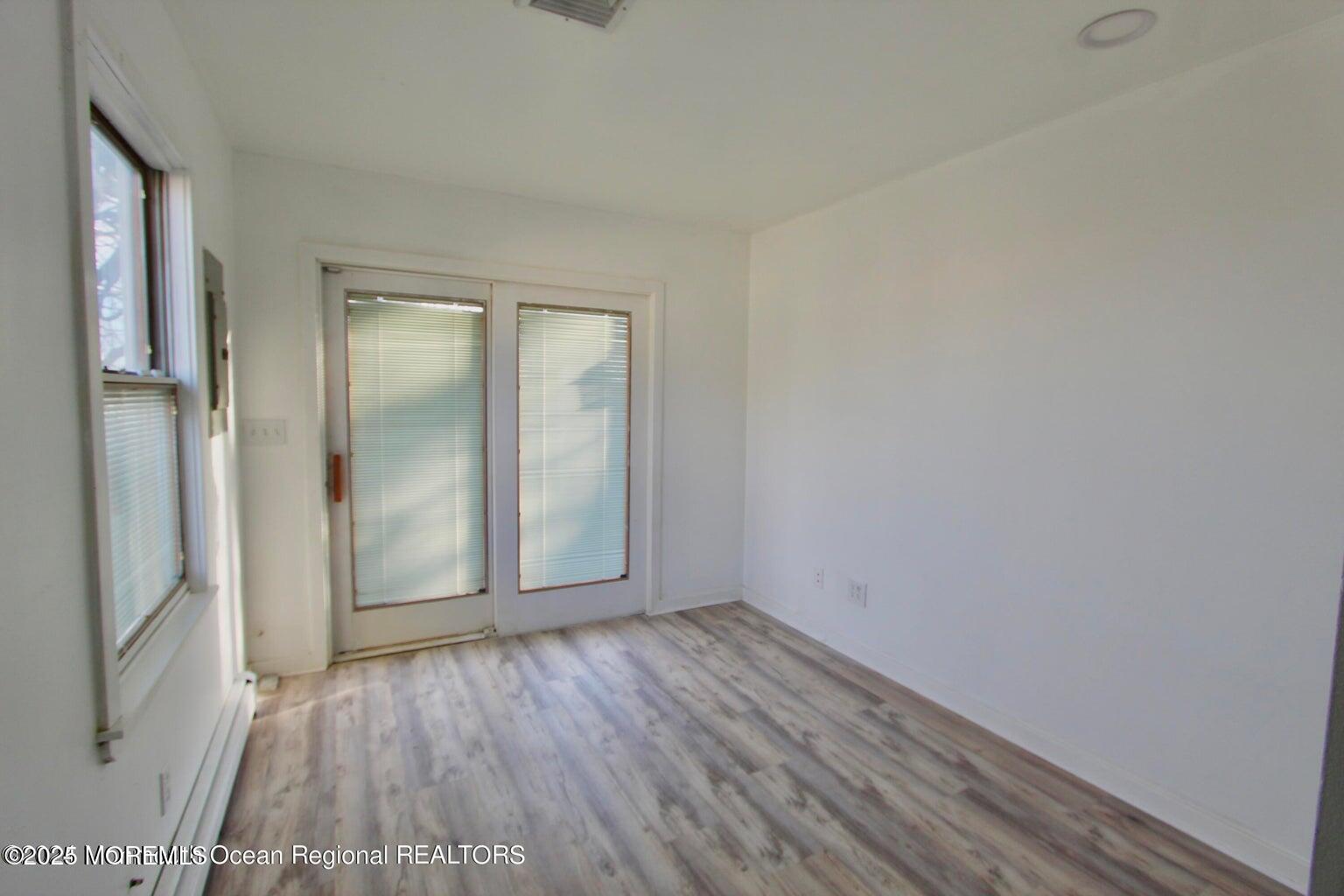 9 Kearney Street, Unit A Keyport, NJ 07735 - Photo 16 of 37 wooden floor in an empty room