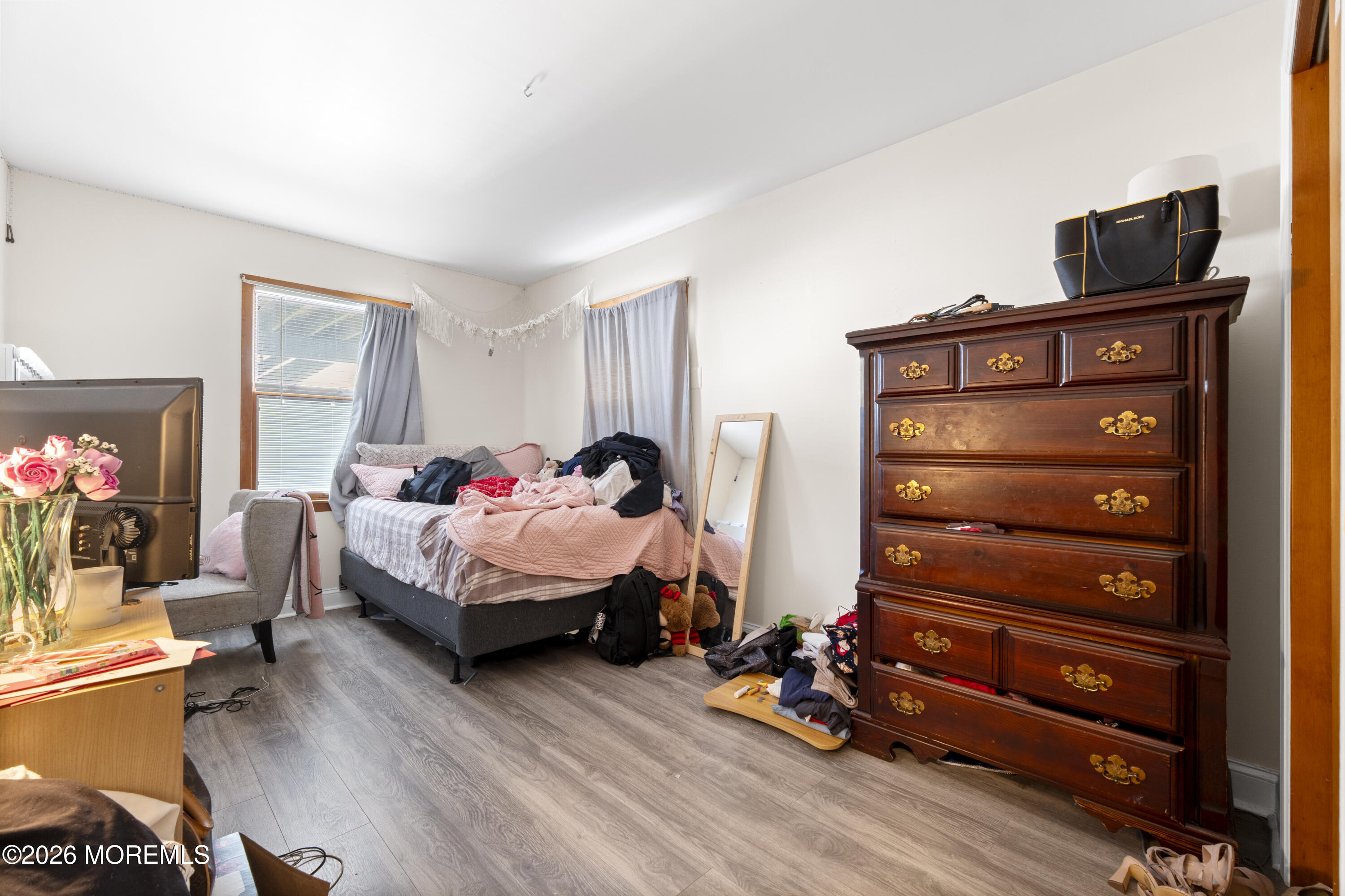 9 Kearney Street, Unit A Keyport, NJ 07735 - Photo 19 of 37 a bedroom with a bed and a tv