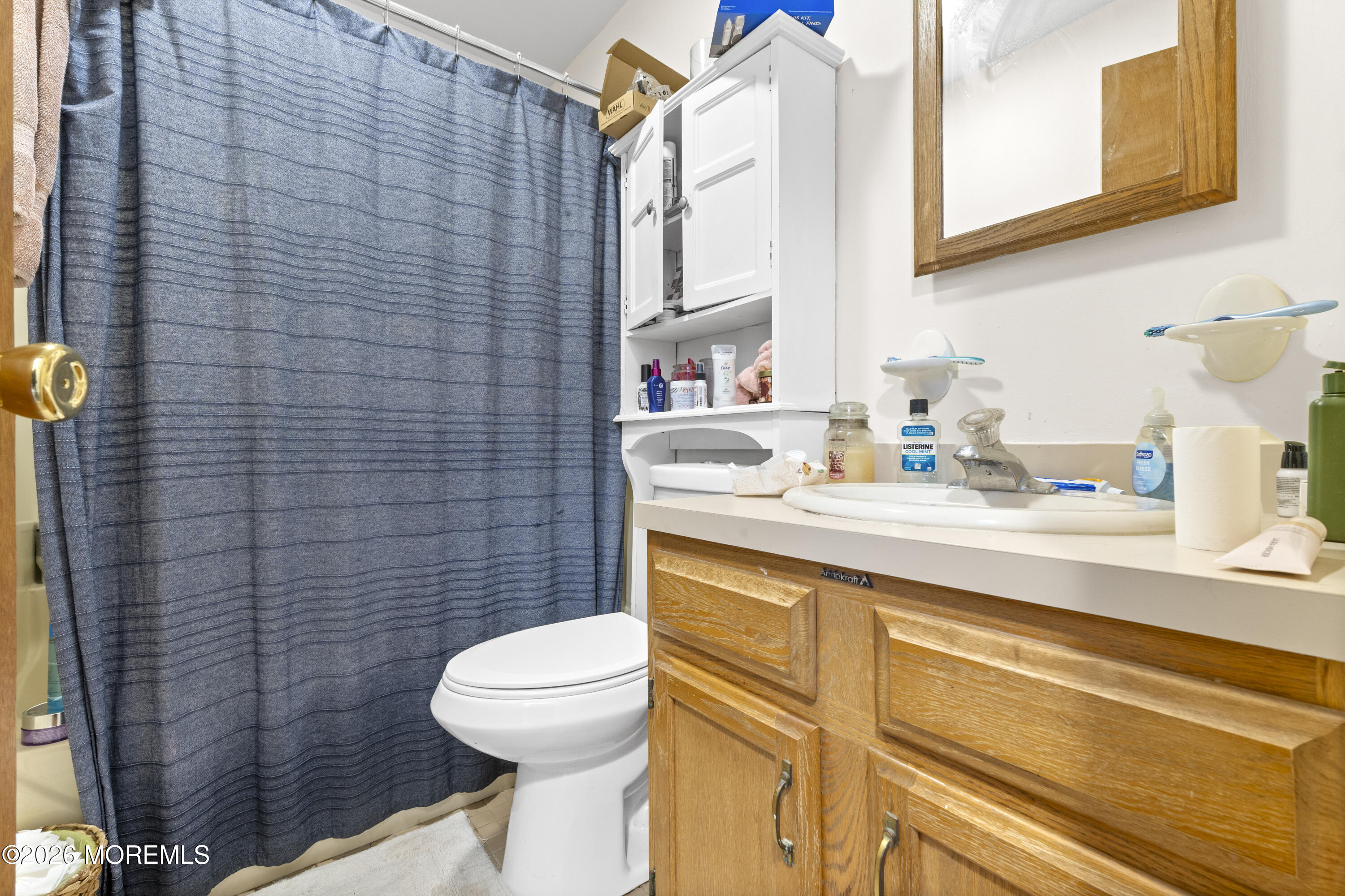 9 Kearney Street, Unit A Keyport, NJ 07735 - Photo 23 of 37 a bathroom with a sink a toilet and shower