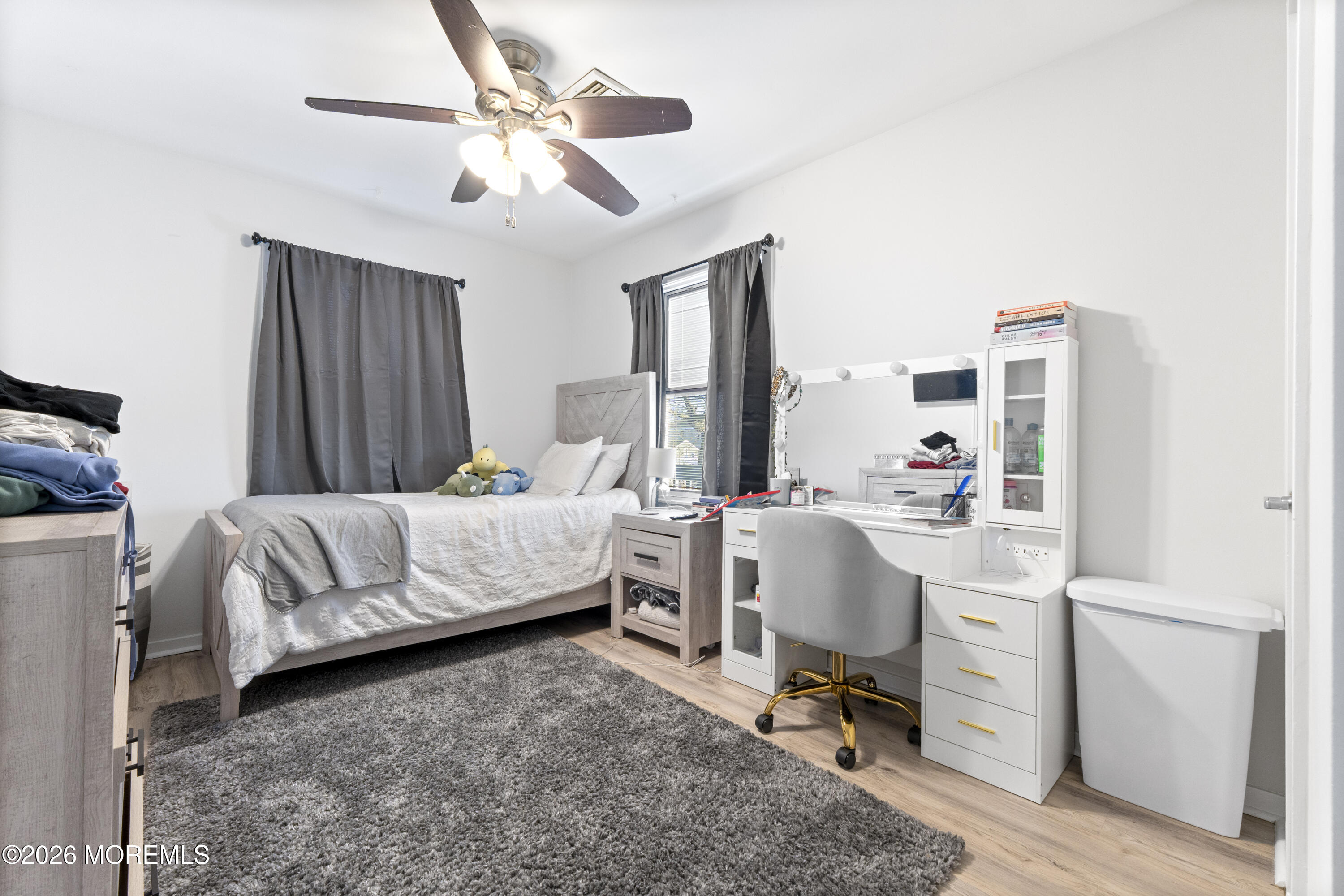 9 Kearney Street, Unit A Keyport, NJ 07735 - Photo 27 of 37 a bedroom with furniture and a window