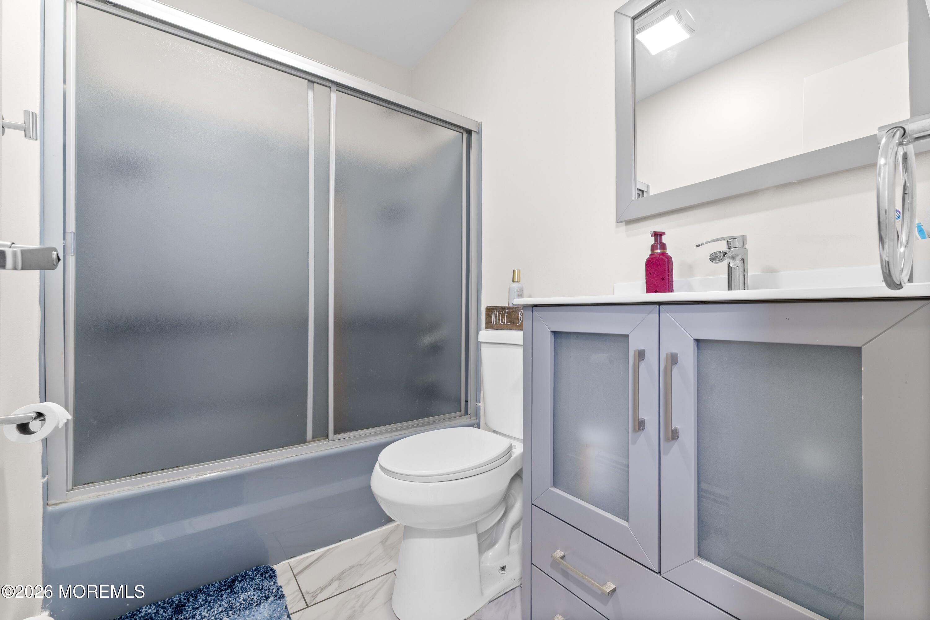 9 Kearney Street, Unit A Keyport, NJ 07735 - Photo 31 of 37 a bathroom with a toilet and a shower