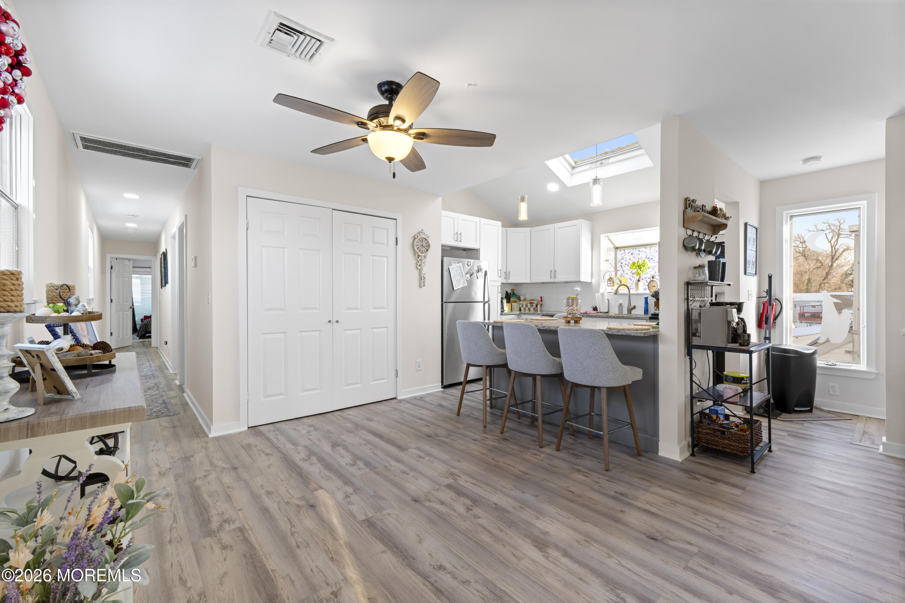 9 Kearney Street, Unit A Keyport, NJ 07735 - Photo 33 of 37 a view of a dining room with furniture and wooden floor