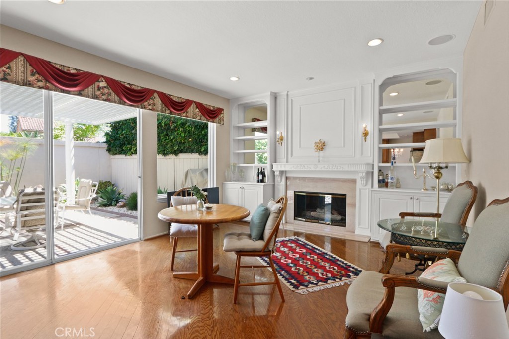 14 Terraza Irvine, CA 92614 - Photo 8 of 16 a living room with furniture fireplace and a large window