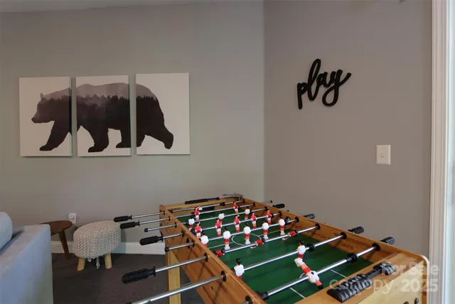 a room with toys and wooden floor