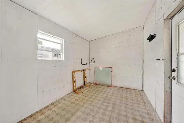 a view of a park with large trees