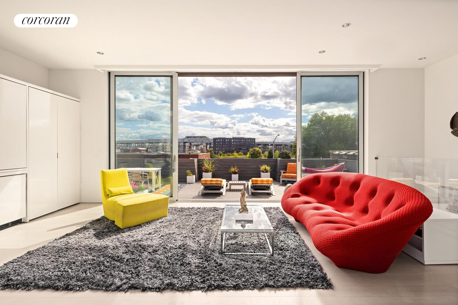 47 4th Street Brooklyn, NY 11231 - Photo 16 of 28 a living room with patio furniture and a window