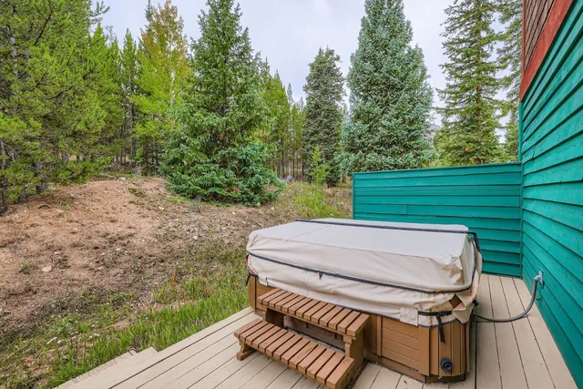 a view of a patio with a yard