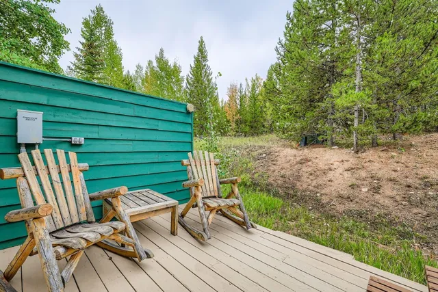 a view of a two chairs in the roof deck