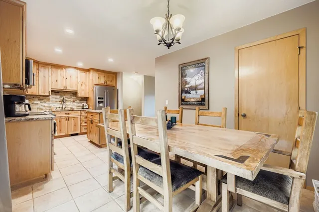 a view of kitchen with cabinets and wooden floor