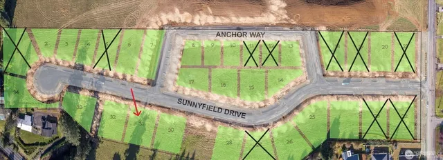 a view of a lake with a yard