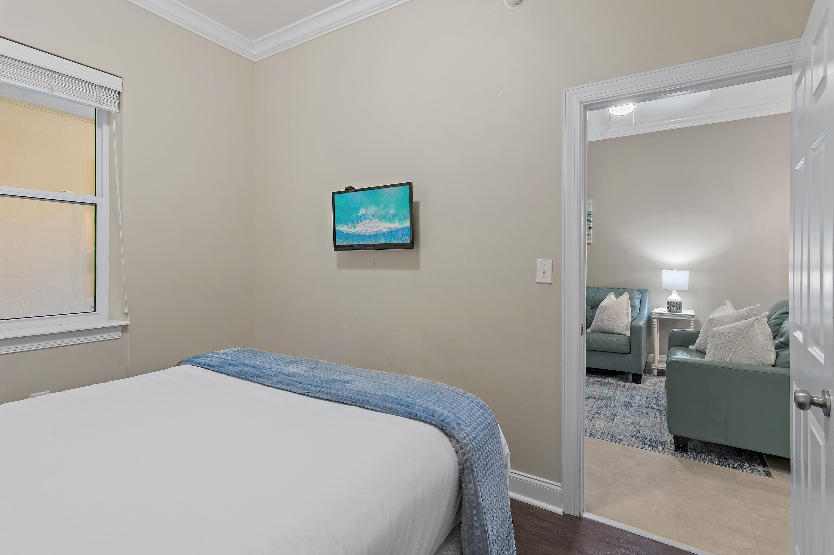 231 Somerset Bridge Road, Unit 2107 Santa Rosa Beach, FL 32459 - Photo 18 of 47 a bedroom with a bed and a painting on the wall