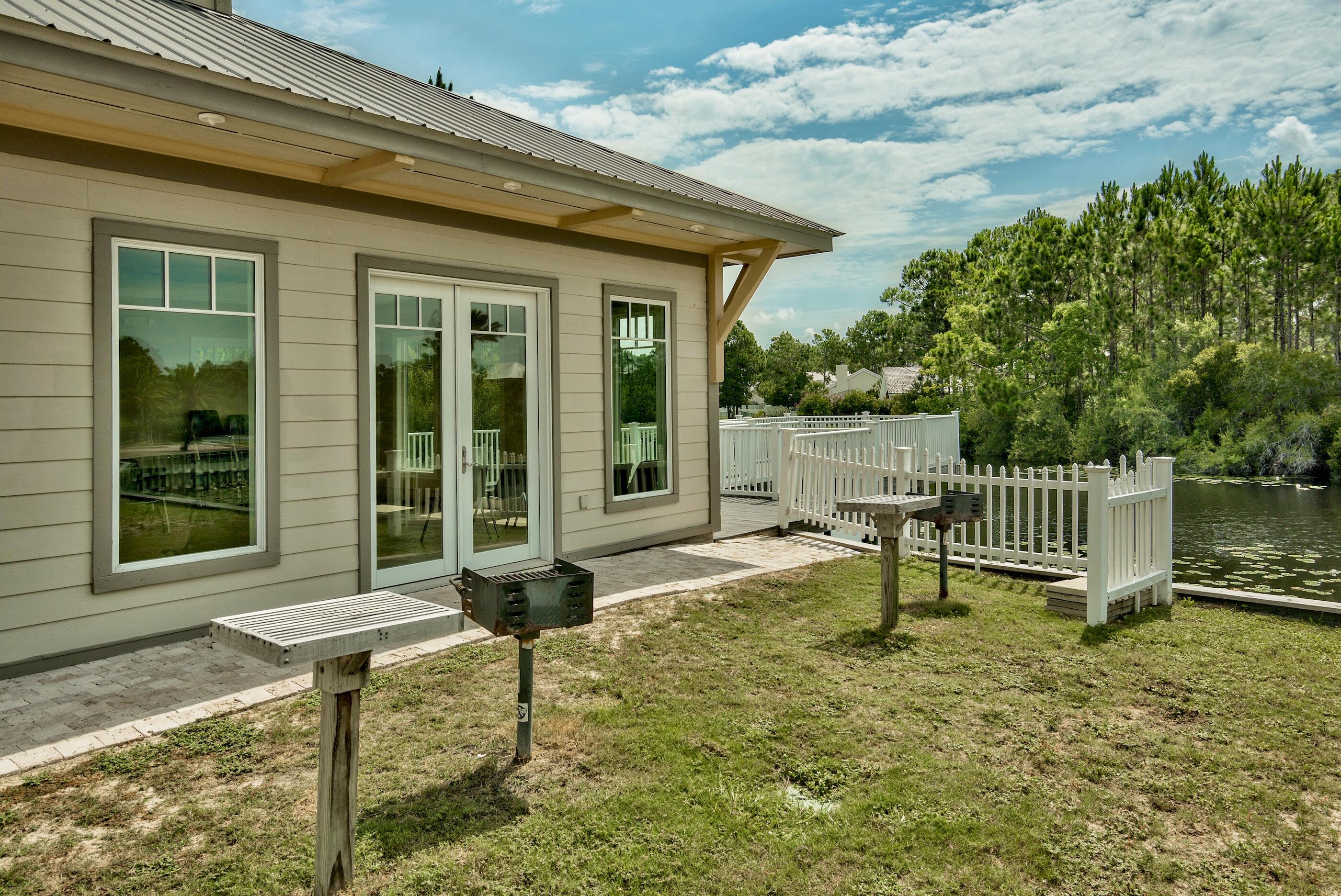 231 Somerset Bridge Road, Unit 2107 Santa Rosa Beach, FL 32459 - Photo 23 of 47 a house view with a garden space