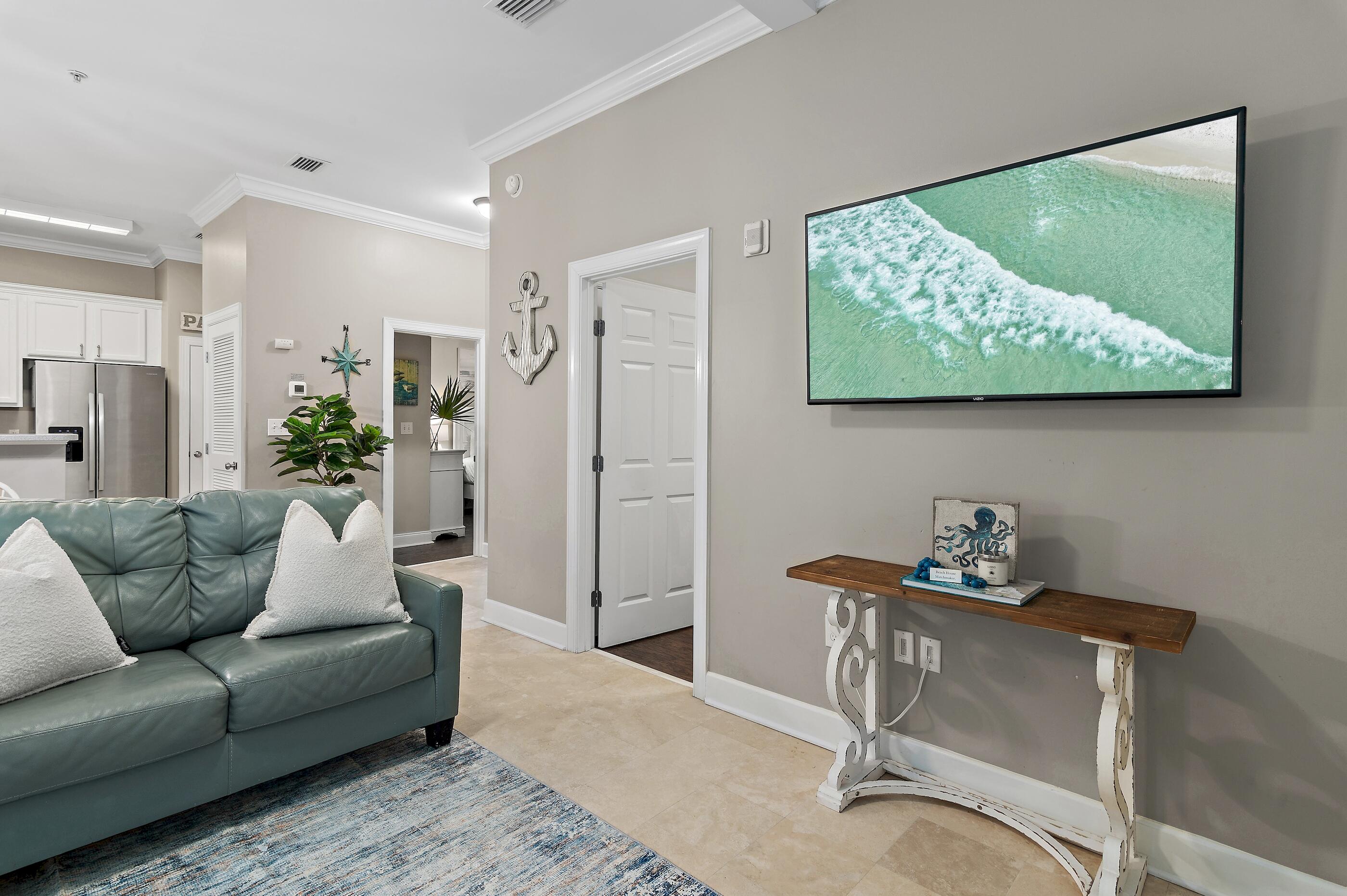 231 Somerset Bridge Road, Unit 2107 Santa Rosa Beach, FL 32459 - Photo 5 of 47 a living room with furniture and a painting