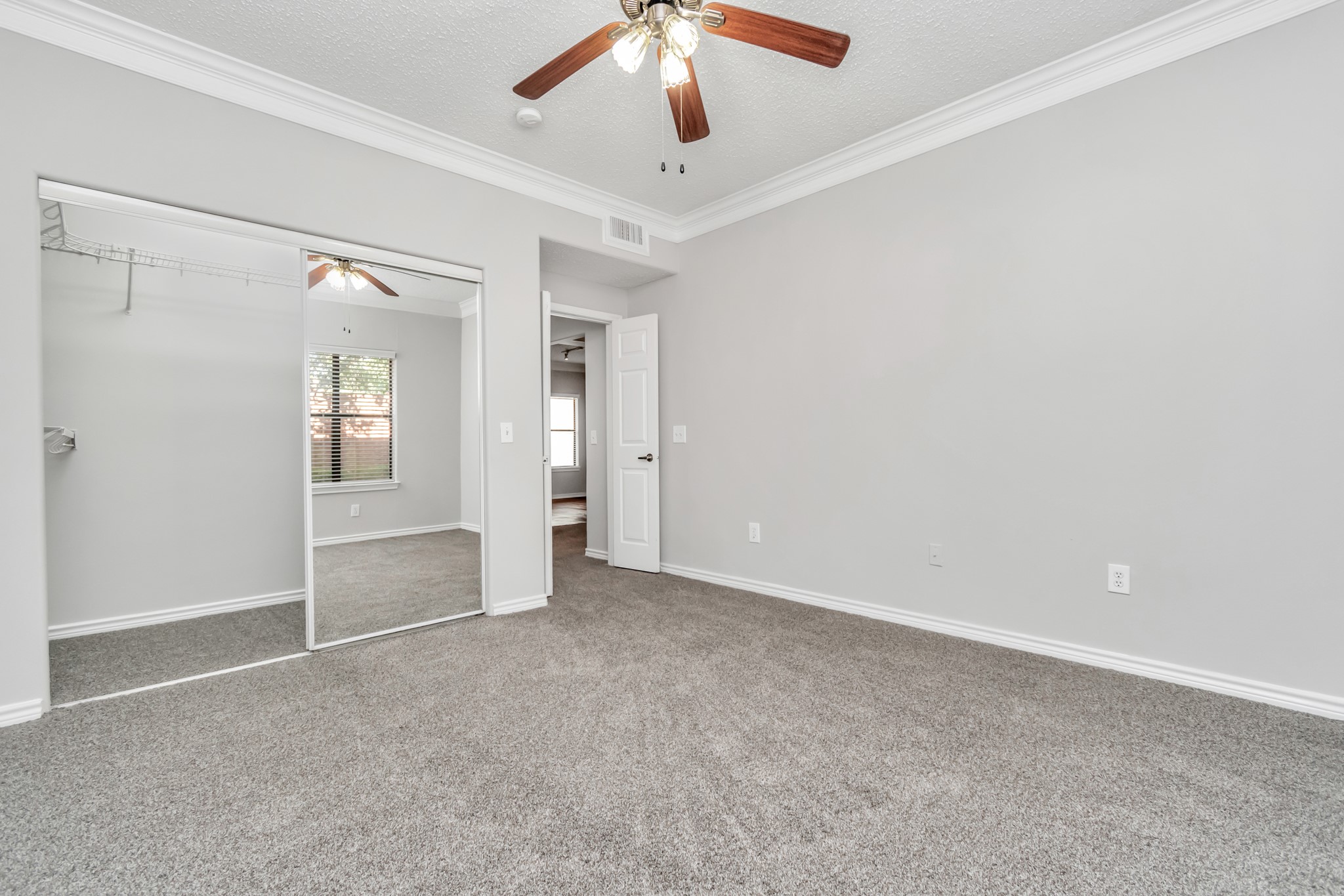 1600 Eldridge Parkway South, Unit 3205 Houston, TX 77077 - Photo 27 of 38 wooden floor in an empty room with a window