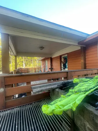 a kitchen with kitchen island a stove and a sink