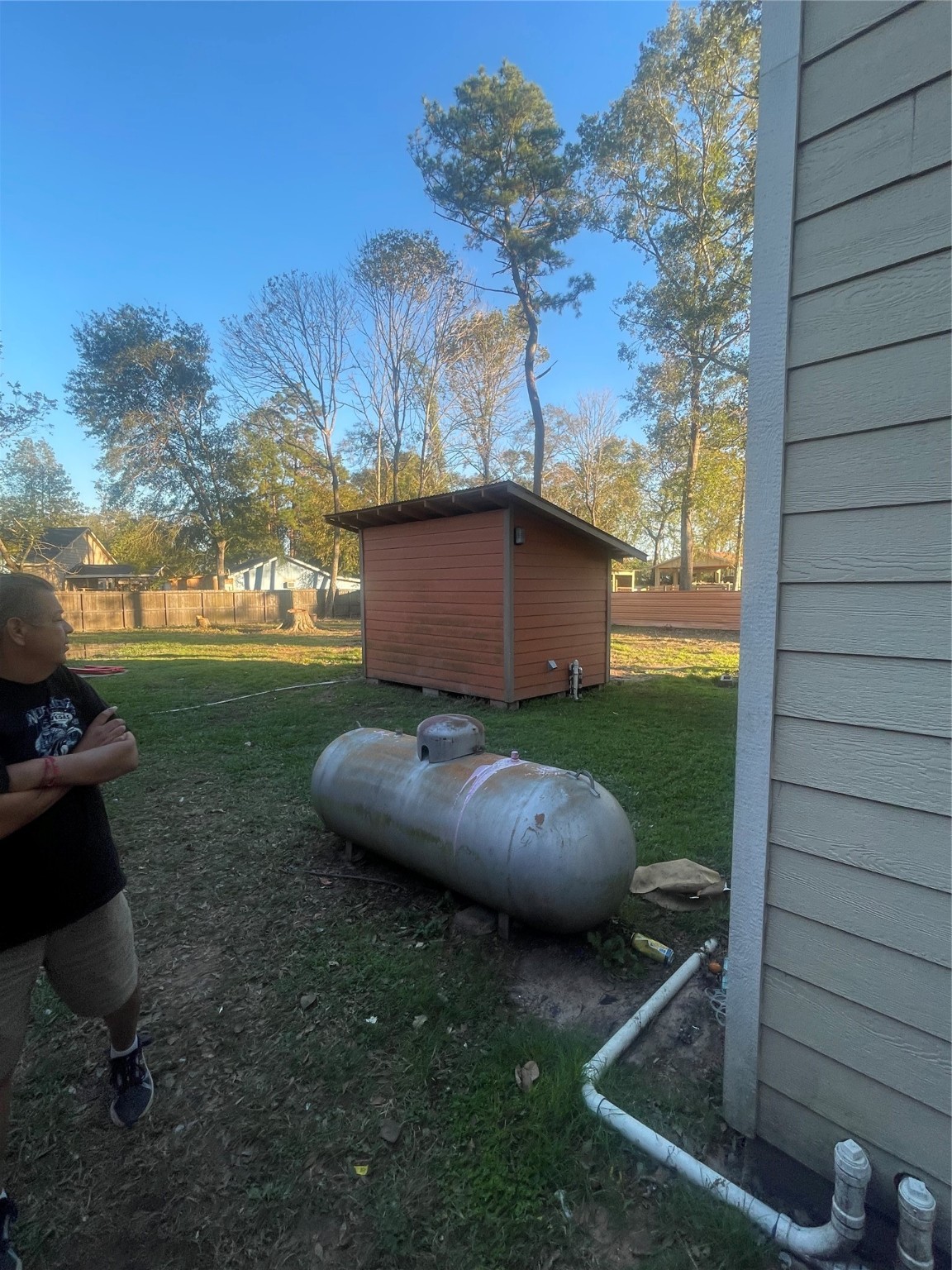397 County Road 379 Cleveland, TX 77328 - Photo 7 of 15 a view of a backyard with hardwood