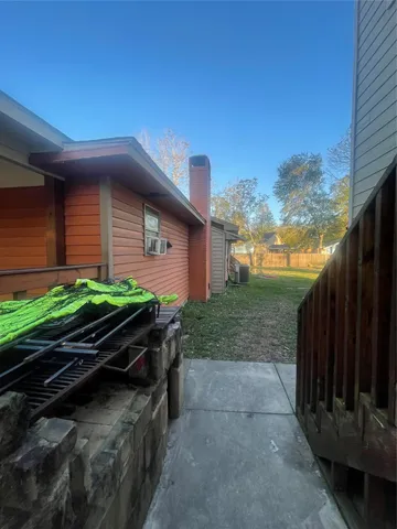 a backyard of a house with lots of green space