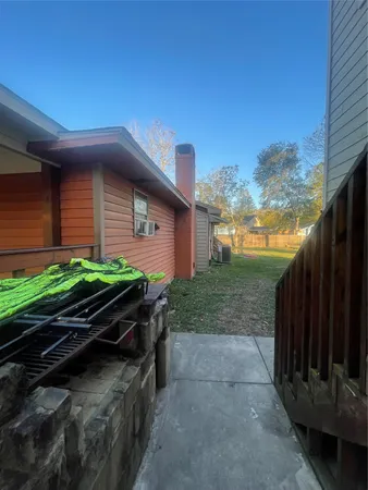 a backyard of a house with lots of green space