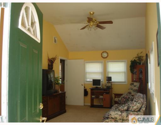 29 Cambridge Road Edison, NJ 08817 - Photo 3 of 10 a living room with furniture
