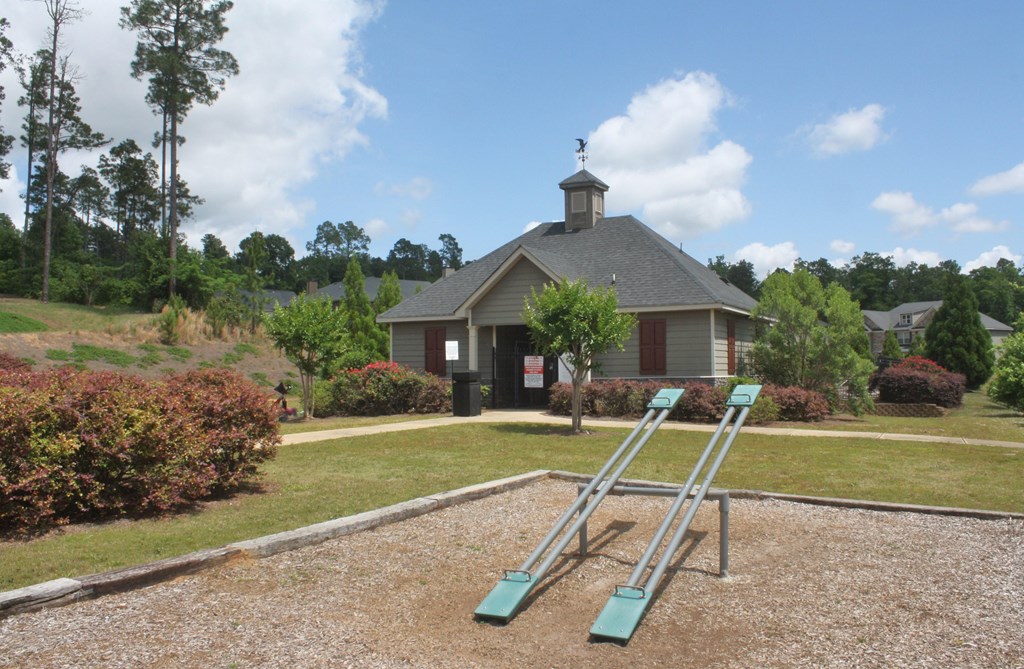 26 Riverside Landing Fort Mitchell, AL 36856 - Photo 65 of 65 a view of a house with a yard and sitting area