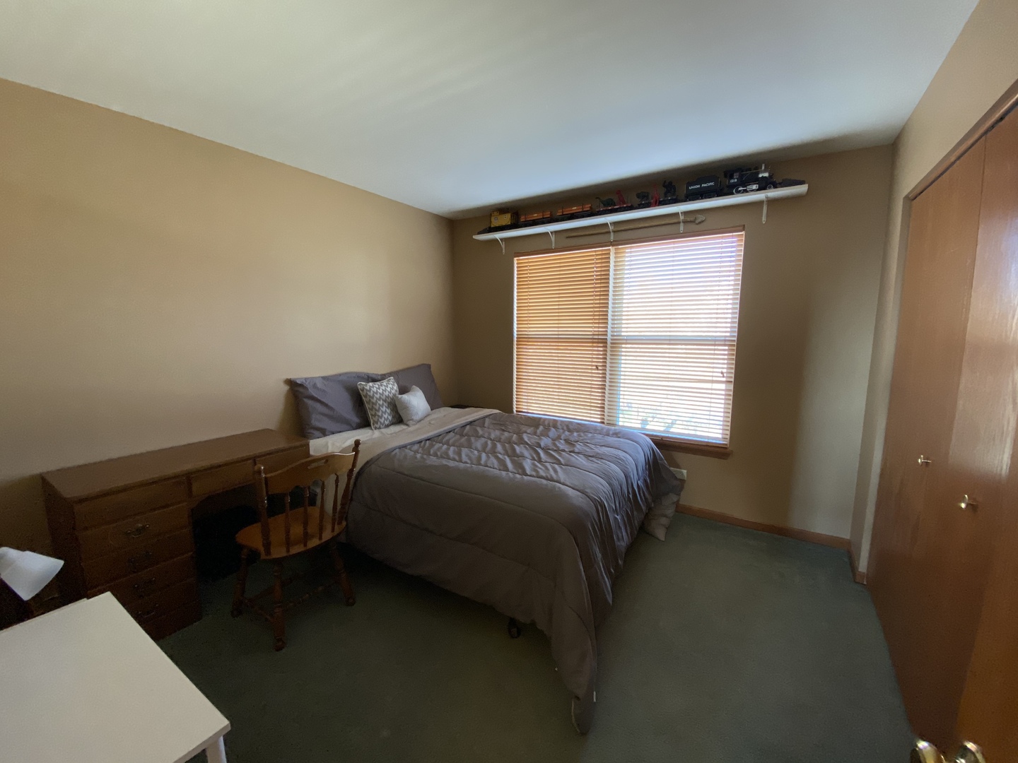 215 Wilkins Road Sycamore, IL 60178 - Photo 20 of 28 a bedroom with a bed and a window