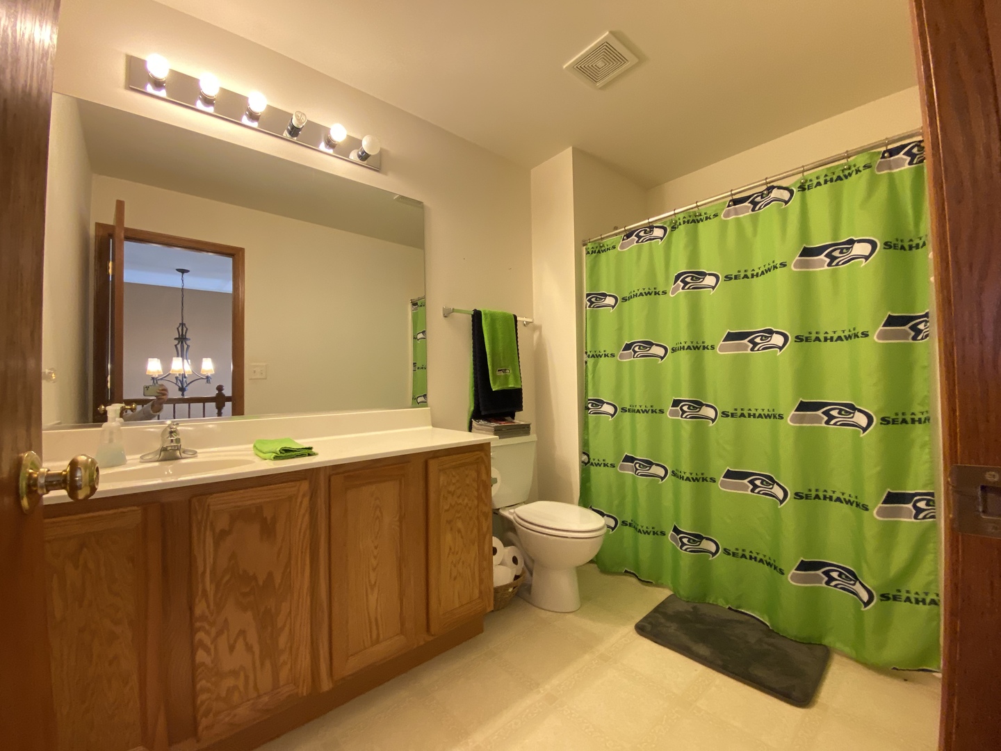 215 Wilkins Road Sycamore, IL 60178 - Photo 21 of 28 a bathroom with a granite countertop toilet sink and mirror
