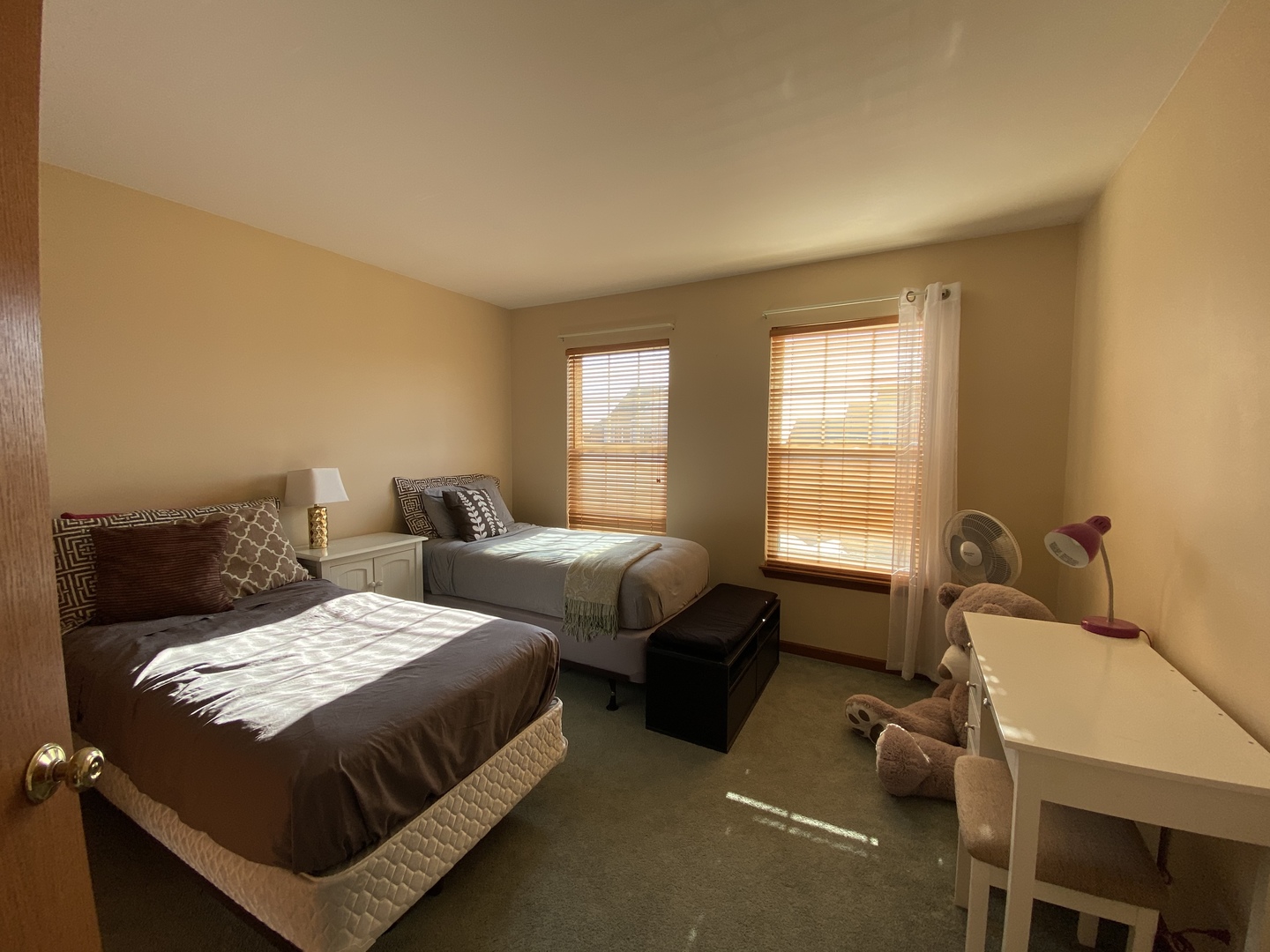 215 Wilkins Road Sycamore, IL 60178 - Photo 22 of 28 a bedroom with two beds and a table chair