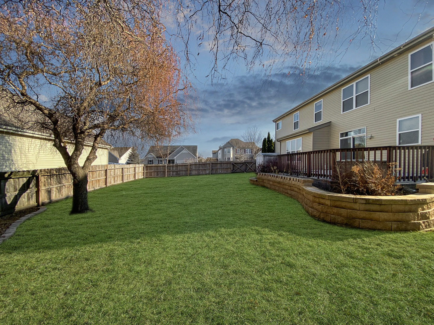 215 Wilkins Road Sycamore, IL 60178 - Photo 27 of 28 a view of house with backyard and outdoor seating