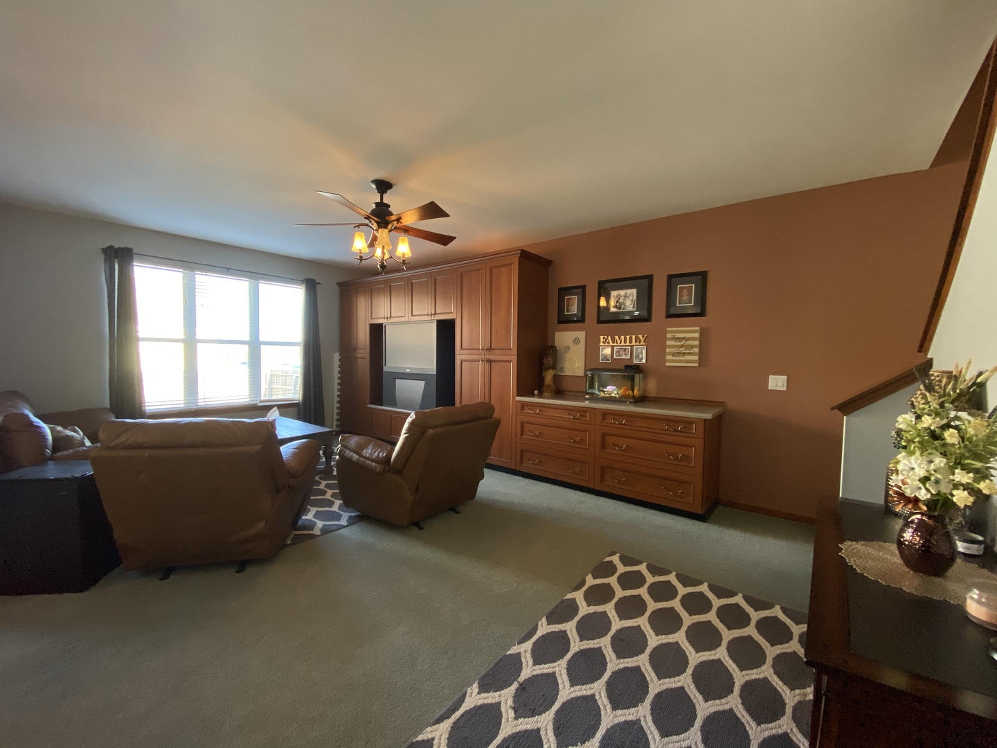 215 Wilkins Road Sycamore, IL 60178 - Photo 7 of 28 a living room with furniture and a window