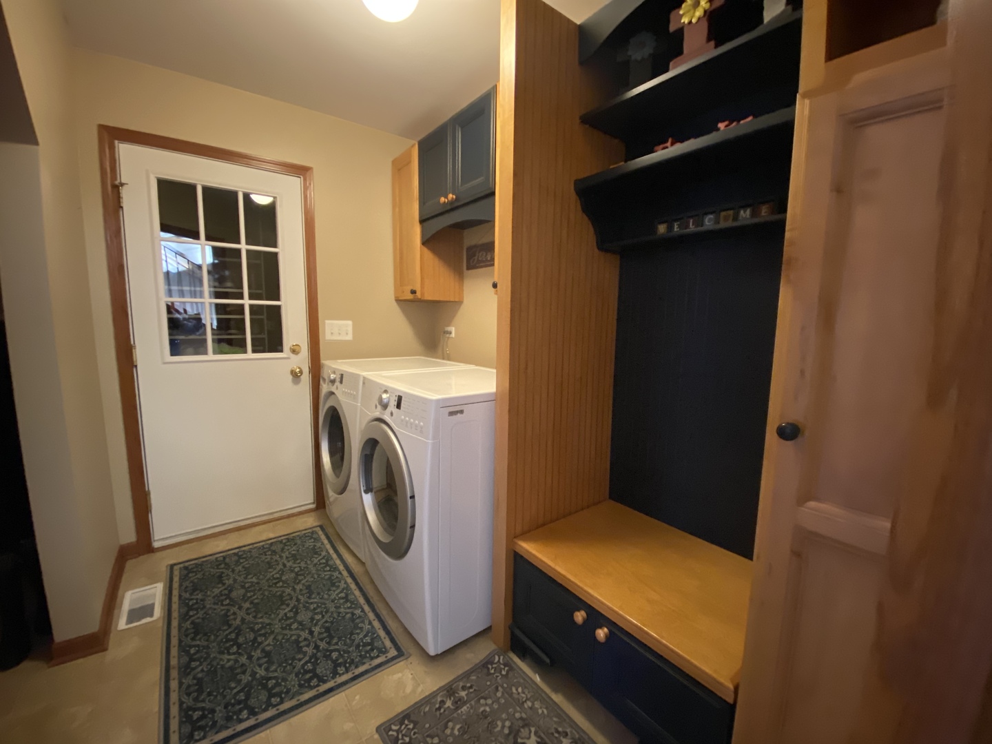 215 Wilkins Road Sycamore, IL 60178 - Photo 9 of 28 a utility room with dryer and washer