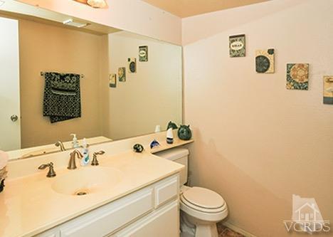 3636 Olds Road Oxnard, CA 93033 - Photo 13 of 23 a bathroom with a sink a toilet and a shower