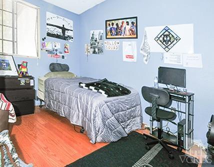 3636 Olds Road Oxnard, CA 93033 - Photo 16 of 23 a bedroom with a bed and a chair in it
