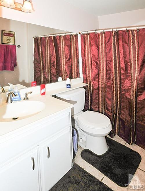 3636 Olds Road Oxnard, CA 93033 - Photo 19 of 23 a bathroom with a sink toilet and window